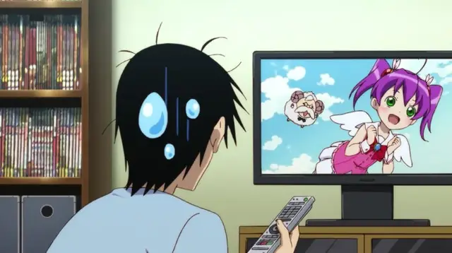 Pengalaman Menonton Anime yang Nyaman Gambar orang menonton anime di layar televisi