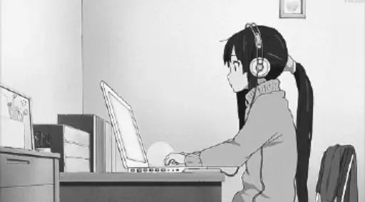 Menikmati Anime di Aplikasi Streaming Favorit Seseorang menonton anime di tablet